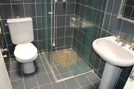 Casa de condomínio para alugar com 320m², 3 quartos e 4 vagasBanheiro da Suíte 3