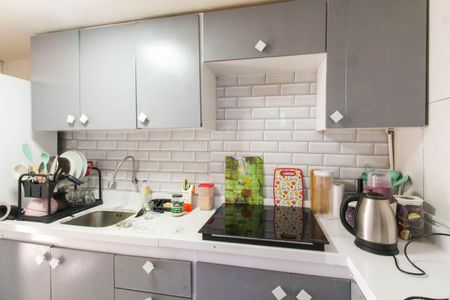 Apartamento à venda com 48m², 2 quartos e 1 vaga Apartamento à venda com 48m², 2 quartos e 1 vagaCozinha e Área de Serviço