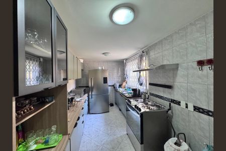 Casa de condomínio à venda com 150m², 3 quartos e 1 vaga Casa de condomínio à venda com 150m², 3 quartos e 1 vagaCozinha e Área de Serviço