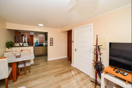 Sala de casa de condomínio à venda com 3 quartos, 84m² em Jardim Itu, Porto Alegre