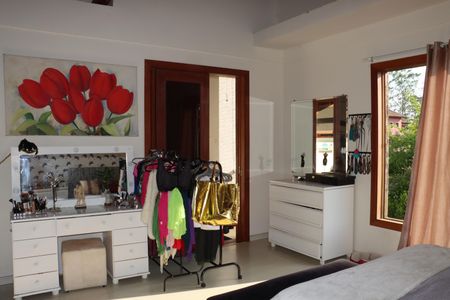 Casa de condomínio para alugar com 458m², 4 quartos e 4 vagasSuíte 1