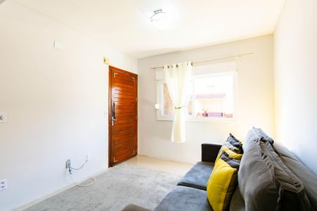 Sala de casa de condomínio para alugar com 3 quartos, 100m² em Harmonia, Canoas