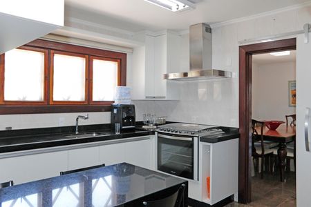 Casa de condomínio para alugar com 384m², 6 quartos e 4 vagasCozinha