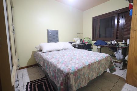 Casa à venda com 231m², 5 quartos e 2 vagasQuarto 01