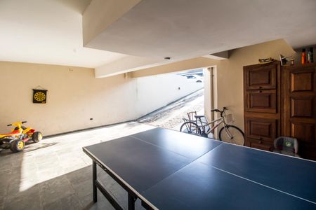 Casa de condomínio à venda com 573m², 4 quartos e 4 vagas Casa de condomínio à venda com 573m², 4 quartos e 4 vagasGaragem