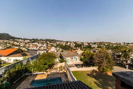 Casa de condomínio à venda com 573m², 4 quartos e 4 vagas Casa de condomínio à venda com 573m², 4 quartos e 4 vagasVista da Suíte