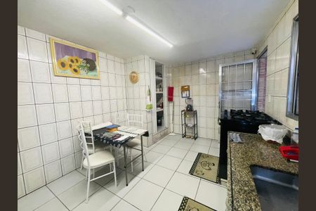 Casa à venda com 125m², 2 quartos e 2 vagas Casa à venda com 125m², 2 quartos e 2 vagasCozinha