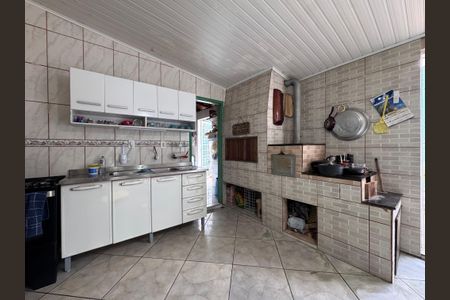 Casa à venda com 110m², 3 quartos e 2 vagas Casa à venda com 110m², 3 quartos e 2 vagasCozinha