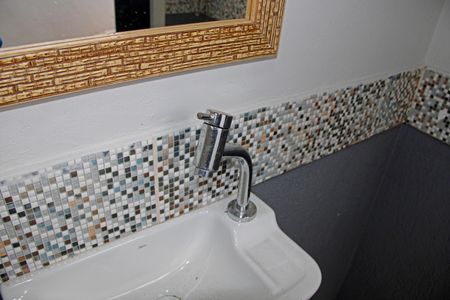 Casa de condomínio para alugar com 200m², 3 quartos e 10 vagasBanheiro da Área Externa