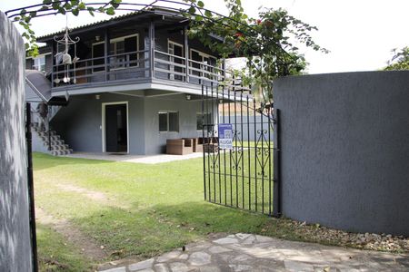 Casa de condomínio para alugar com 200m², 3 quartos e 10 vagasFachada
