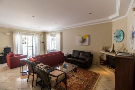 Casa de condomínio à venda com 300m², 4 quartos e 4 vagasSala