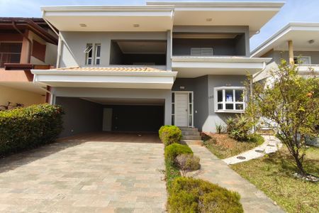 Casa de condomínio à venda com 334m², 4 quartos e 4 vagas Casa de condomínio à venda com 334m², 4 quartos e 4 vagasFachada