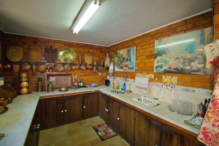 Casa à venda com 485m², 3 quartos e 6 vagas Casa à venda com 485m², 3 quartos e 6 vagasCozinha