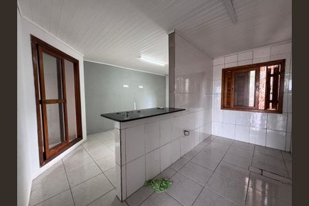 Casa à venda com 70m², 2 quartos e 2 vagas Casa à venda com 70m², 2 quartos e 2 vagasCozinha