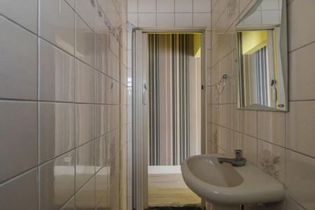 Casa à venda com 260m², 3 quartos e 2 vagas Casa à venda com 260m², 3 quartos e 2 vagasBanheiro 1