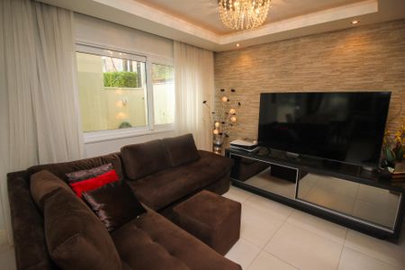 Casa de condomínio para alugar com 218m², 4 quartos e 2 vagasSala