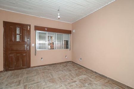 Sala de casa à venda com 3 quartos, 150m² em Petrópolis, Porto Alegre