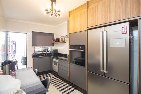 Casa à venda com 200m², 3 quartos e 3 vagas Casa à venda com 200m², 3 quartos e 3 vagasCozinha