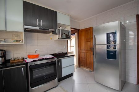 Casa à venda com 107m², 4 quartos e 2 vagas Casa à venda com 107m², 4 quartos e 2 vagasCozinha