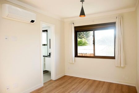Quarto 1 Suíte de apartamento para alugar com 2 quartos, 58m² em Auxiliadora, Porto Alegre