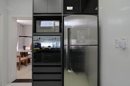 Casa de condomínio para alugar com 240m², 4 quartos e 4 vagasCozinha