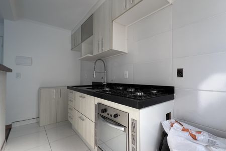 Apartamento à venda com 48m², 2 quartos e 1 vaga Apartamento à venda com 48m², 2 quartos e 1 vagaCozinha e Área de Serviço