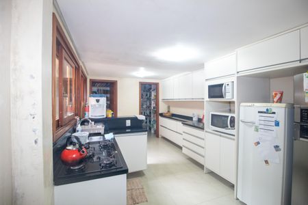 Casa à venda com 176m², 4 quartos e 2 vagas Casa à venda com 176m², 4 quartos e 2 vagasCozinha