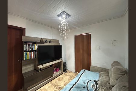 Casa à venda com 57m², 2 quartos e 2 vagasSala