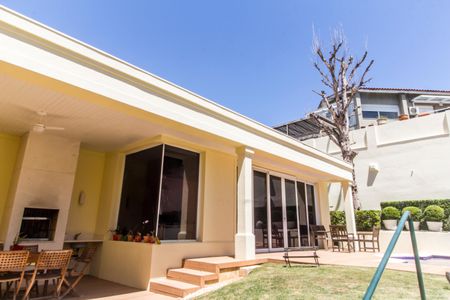 Casa de condomínio à venda com 414m², 4 quartos e 4 vagas Casa de condomínio à venda com 414m², 4 quartos e 4 vagasVista da Sala