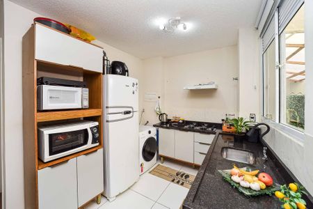 Apartamento à venda com 47m², 2 quartos e 1 vaga Apartamento à venda com 47m², 2 quartos e 1 vagaCozinha e Área de Serviço