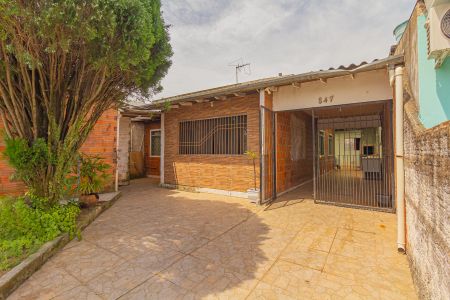 Fachada de casa à venda com 4 quartos, 112m² em Estância Velha, Canoas