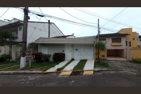 Casa de condomínio à venda com 241m², 4 quartos e 3 vagas Casa de condomínio à venda com 241m², 4 quartos e 3 vagasFachada com Placa