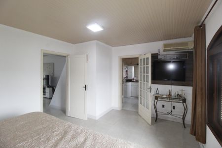 Suíte 1 de casa para alugar com 3 quartos, 210m² em Parque Santa Fé, Porto Alegre