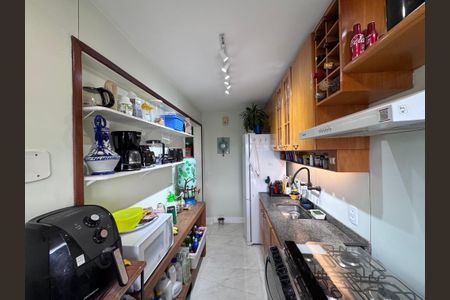 Apartamento à venda com 75m², 2 quartos e 2 vagas Apartamento à venda com 75m², 2 quartos e 2 vagasCozinha e Área de Serviço