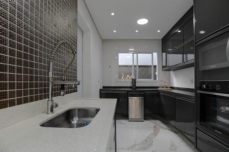 Casa de condomínio para alugar com 240m², 3 quartos e 4 vagasCozinha