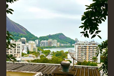 Sala - vista para a lagoa de apartamento para alugar com 2 quartos, 70m² em Jardim Botânico, Rio de Janeiro