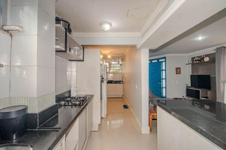 Casa de condomínio à venda com 128m², 3 quartos e 2 vagas Casa de condomínio à venda com 128m², 3 quartos e 2 vagasCozinha e Área de Serviço
