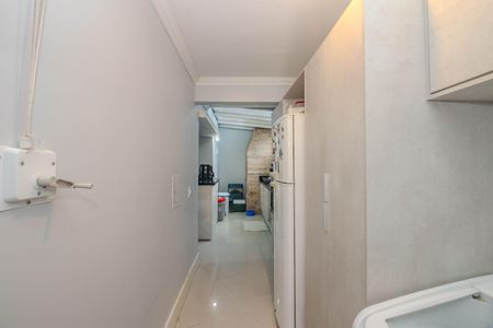 Casa de condomínio à venda com 128m², 3 quartos e 2 vagas Casa de condomínio à venda com 128m², 3 quartos e 2 vagasCozinha e Área de Serviço