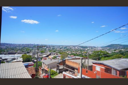 Vista  de casa à venda com 3 quartos, 100m² em Coronel Aparicio Borges, Porto Alegre
