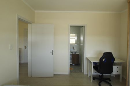 Suíte 1 de apartamento para alugar com 1 quarto, 42m² em Jardim Botânico, Porto Alegre